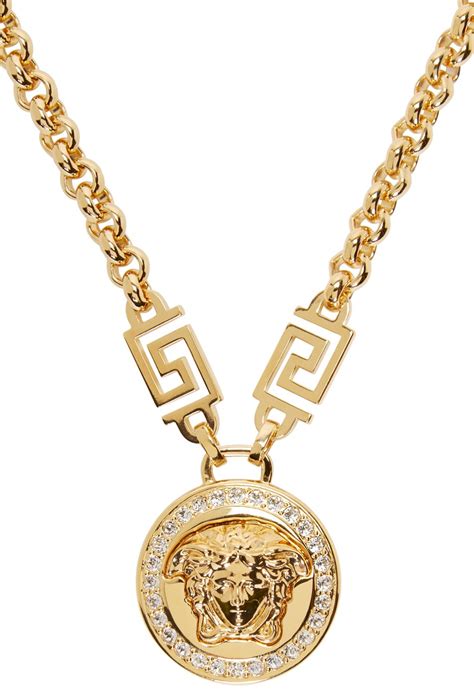 versace gold chain and pendant.